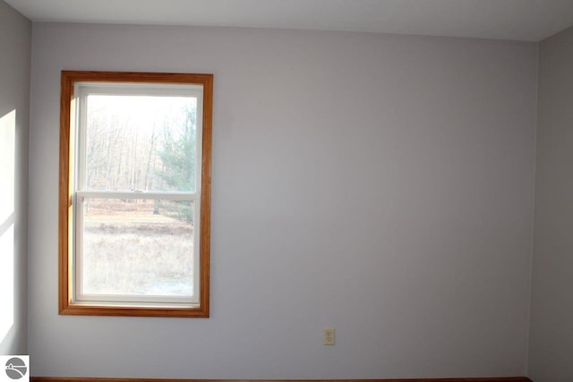 empty room featuring plenty of natural light