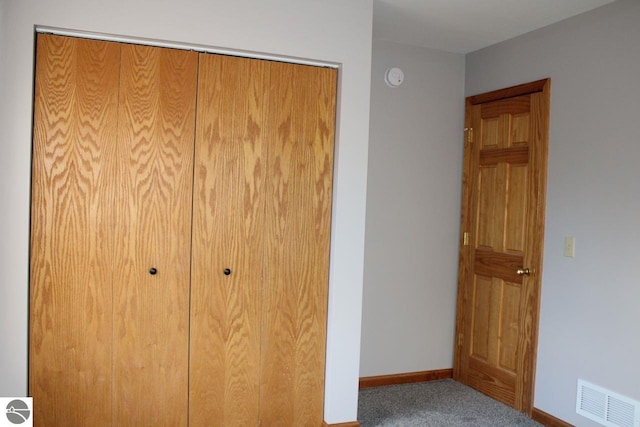 unfurnished bedroom with a closet