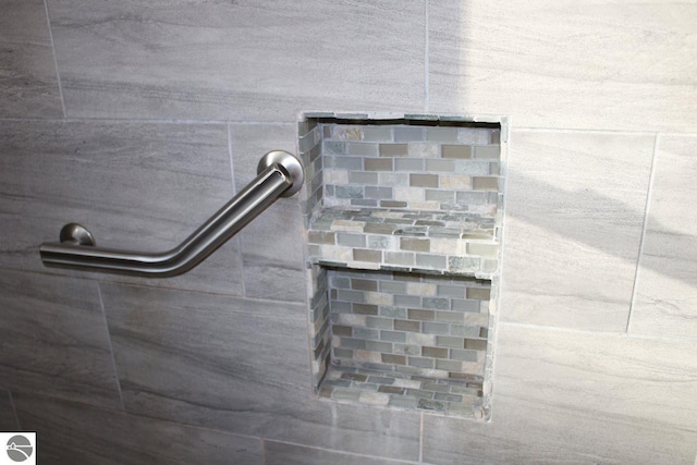 interior details with tiled shower