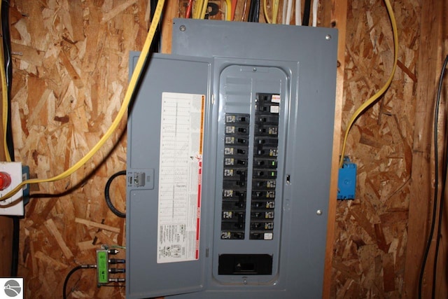 utility room featuring electric panel