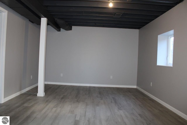 basement with wood-type flooring