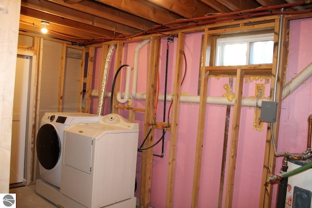 laundry room featuring washing machine and clothes dryer