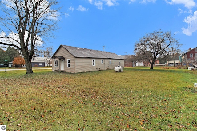 exterior space with a yard