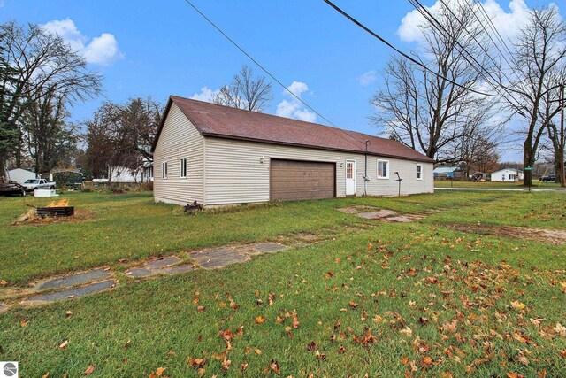 view of property exterior featuring a lawn