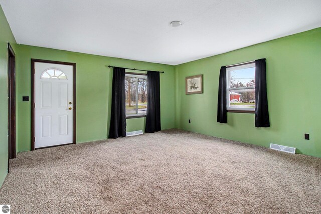 spare room with carpet flooring