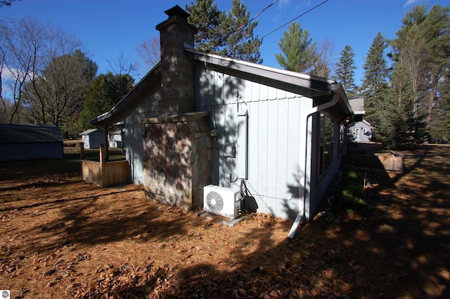 view of outbuilding with ac unit