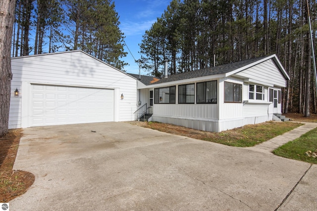 view of front of property with a garage