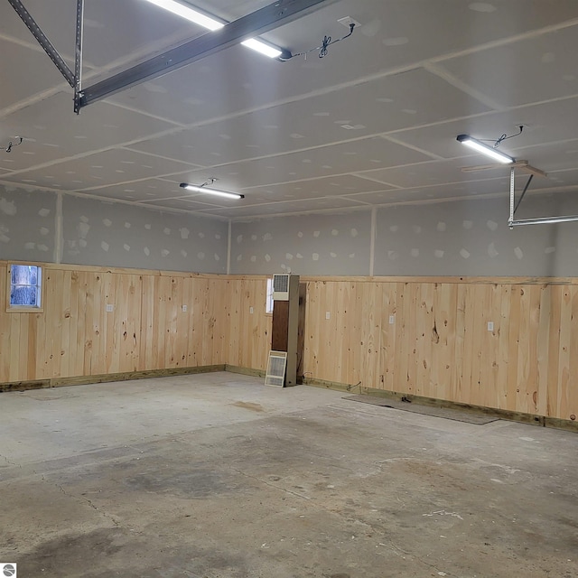 garage with wood walls