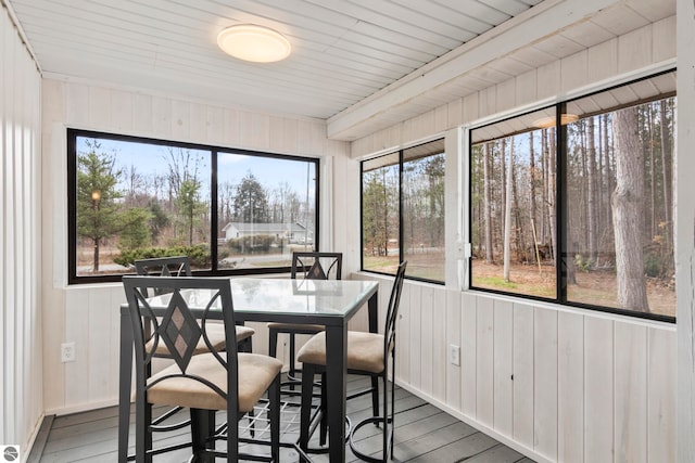 sunroom featuring wooden ceiling