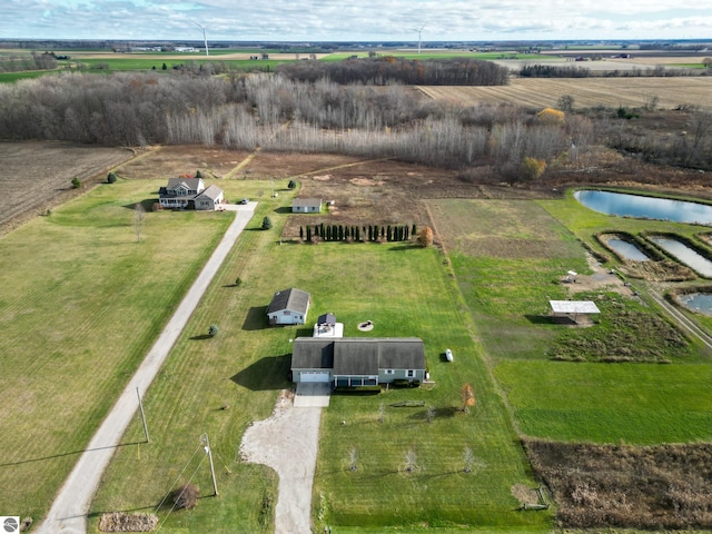 aerial view featuring a rural view and a water view