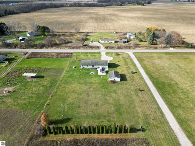 birds eye view of property featuring a rural view