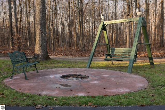 view of patio / terrace featuring a fire pit