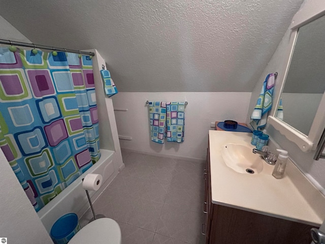 full bathroom featuring toilet, vanity, vaulted ceiling, and shower / tub combo with curtain