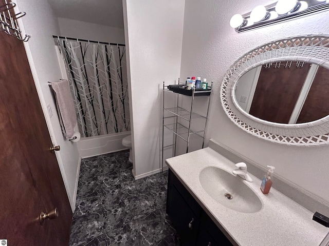 full bathroom featuring toilet, vanity, and shower / bath combo with shower curtain