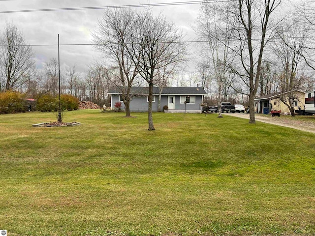 view of front of home with a front lawn