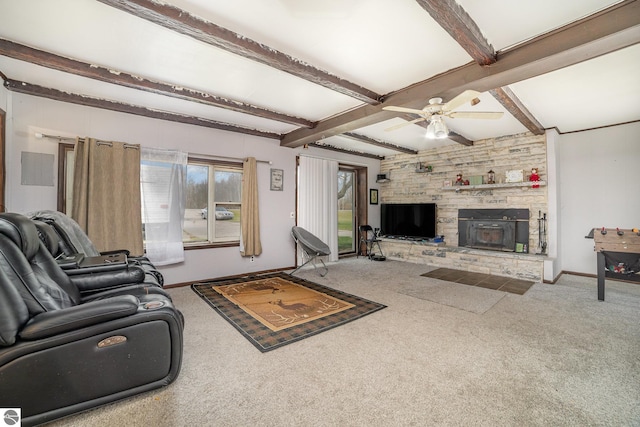 carpeted living room featuring ceiling fan and beam ceiling