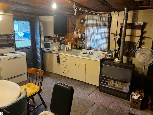 kitchen with white appliances and sink