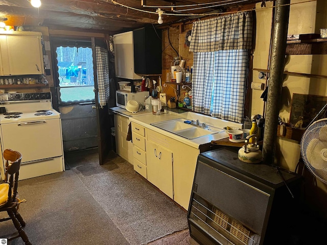 kitchen with white appliances and sink