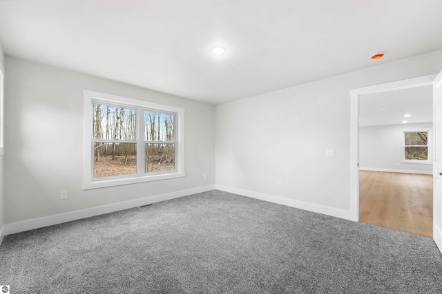 spare room featuring carpet floors