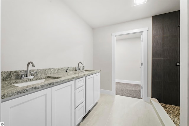 bathroom featuring tile patterned floors and vanity