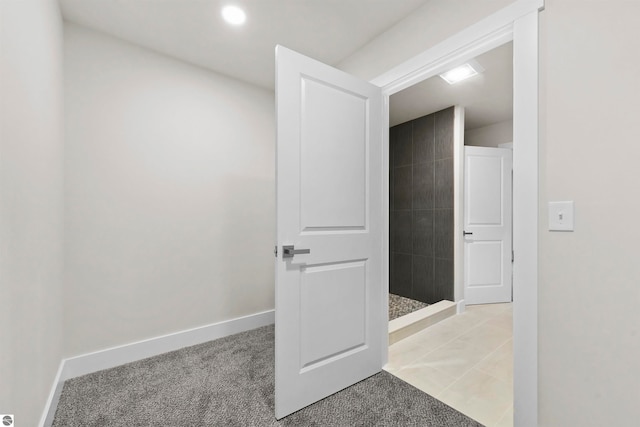 bathroom with tile patterned floors