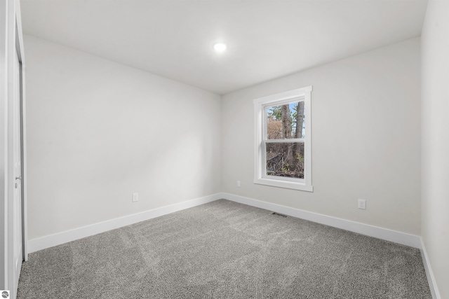 view of carpeted spare room