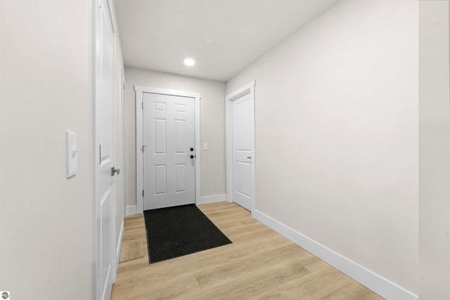 doorway to outside with light hardwood / wood-style floors