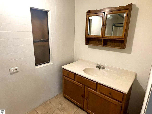 bathroom featuring vanity and tile patterned floors