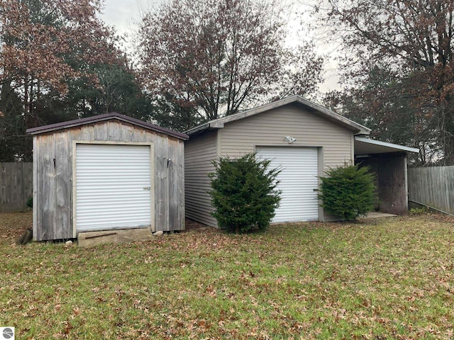 garage with a yard