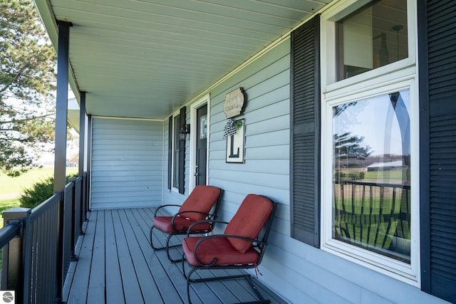 wooden terrace with covered porch