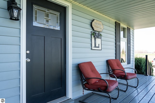 property entrance featuring a porch