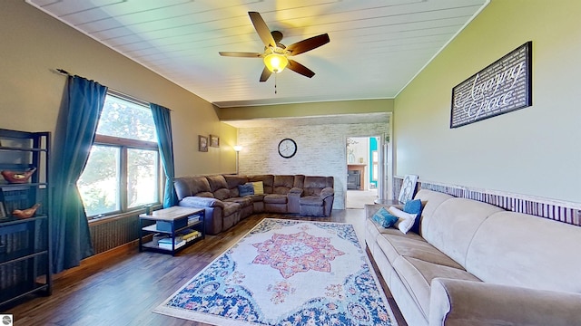 living room with dark hardwood / wood-style flooring, ceiling fan, and wood ceiling