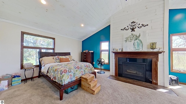 carpeted bedroom with multiple windows, wooden ceiling, vaulted ceiling, and ornamental molding