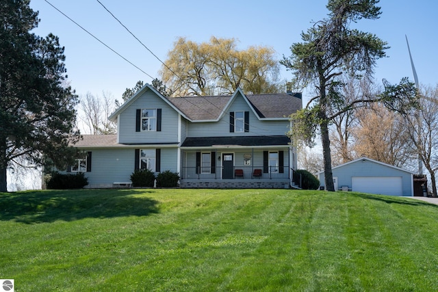 view of property with covered porch, a garage, an outdoor structure, and a front yard