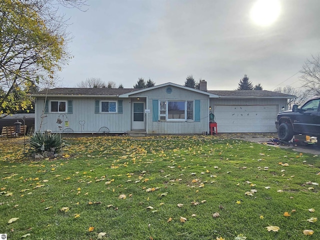 9100 E Miller Rd, Durand, MI 48429 - ranch-style house featuring an attached garage, asphalt driveway, a front lawn, and a chimney