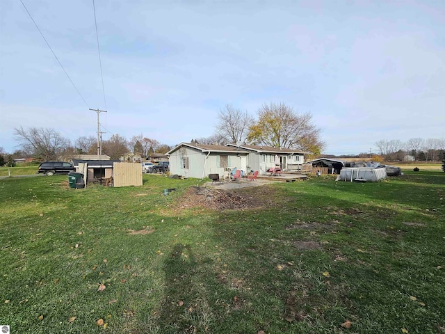 view of yard with a patio area