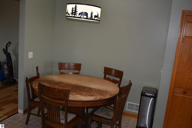 dining space featuring light hardwood / wood-style flooring