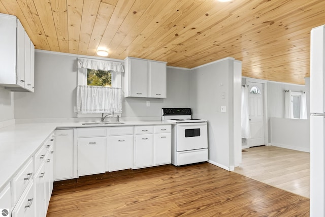 kitchen featuring stove, light hardwood / wood-style floors, white cabinetry, and sink