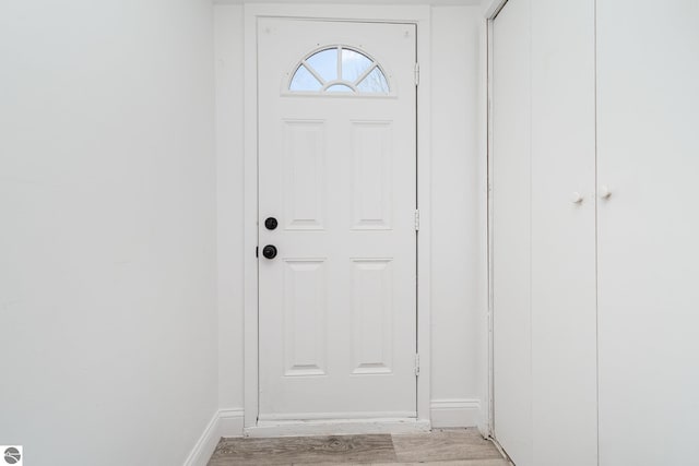 doorway to outside featuring light wood-type flooring