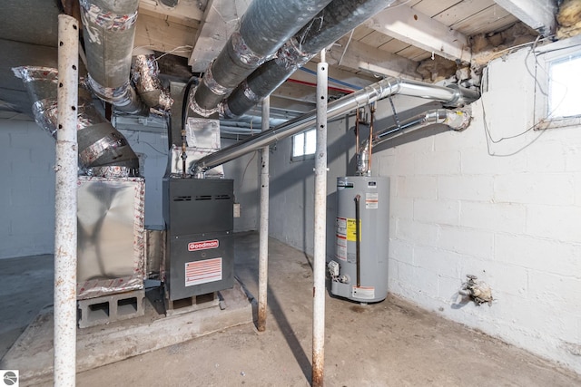 726 Pennsylvania Ave, Alma, MI 48801 - utility room with water heater