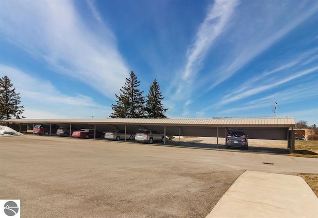 view of parking featuring a carport