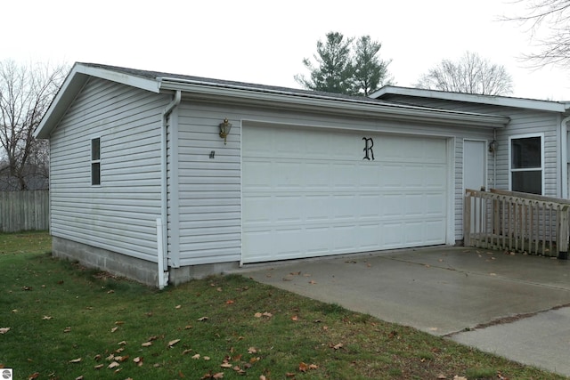 garage with a yard