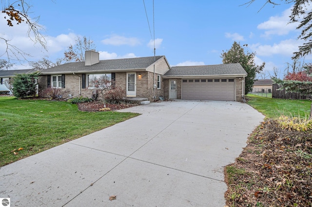 single story home with a front yard and a garage