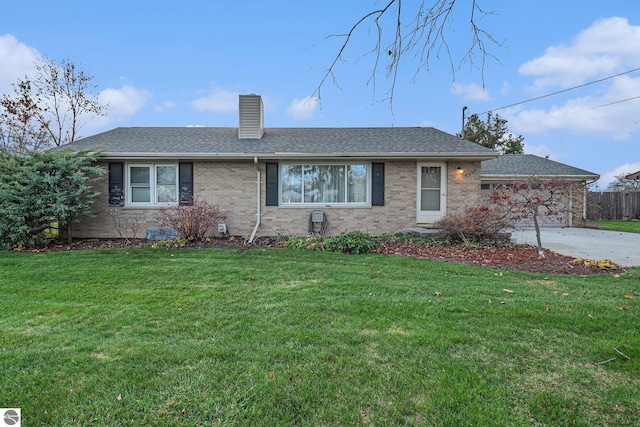 ranch-style home with a front lawn