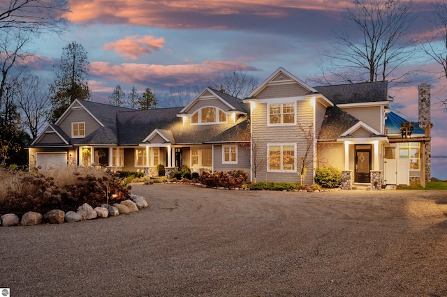 craftsman-style house with a garage