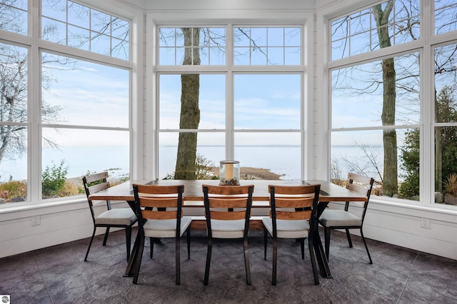 91 S Nanagosa Trl, Suttons Bay, MI 49682 - sunroom / solarium featuring a water view