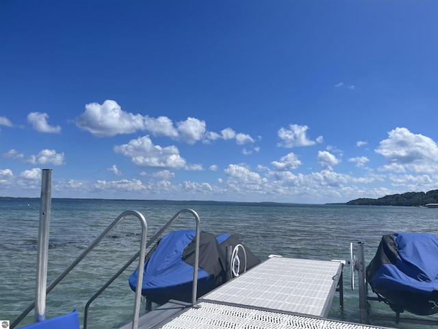 91 S Nanagosa Trl, Suttons Bay, MI 49682 - dock featuring a water view