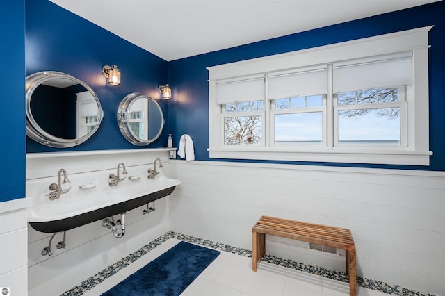 bathroom featuring tile patterned flooring and sink