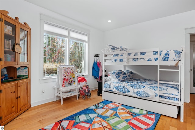 bedroom with light hardwood / wood-style flooring