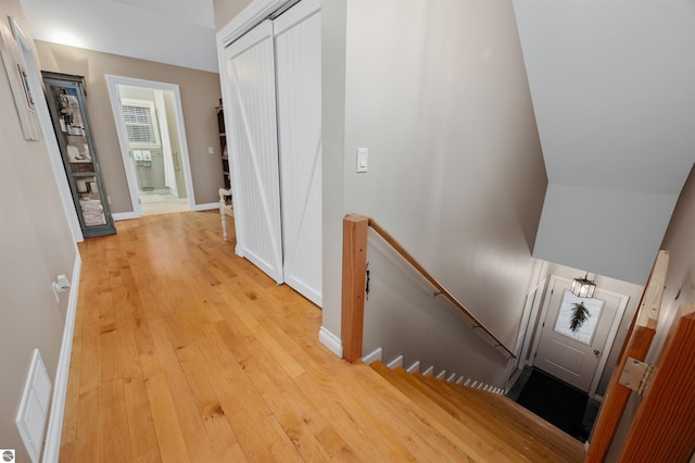 corridor featuring light wood-type flooring